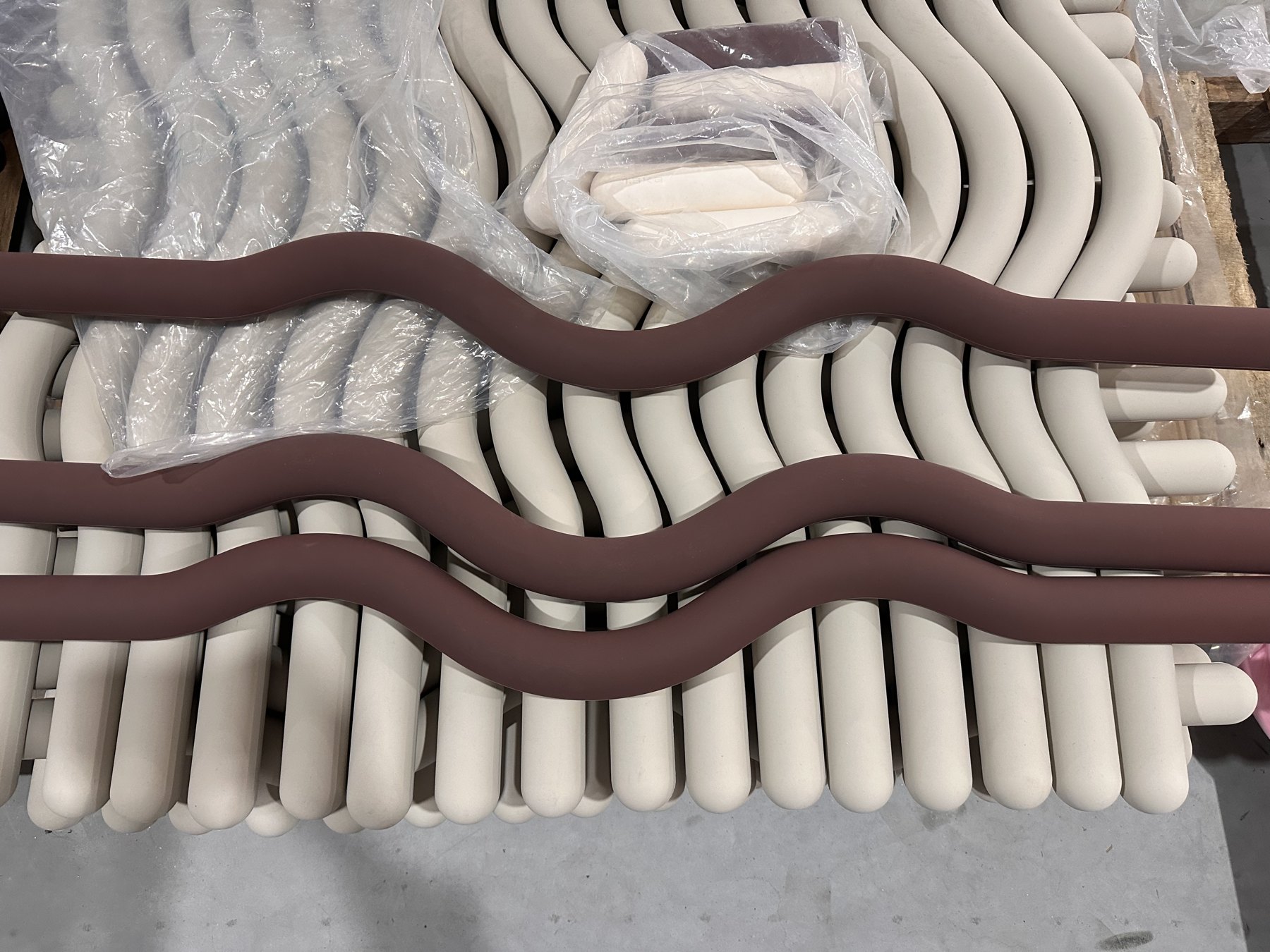 Real cream and taupe silicone weighted bars in production