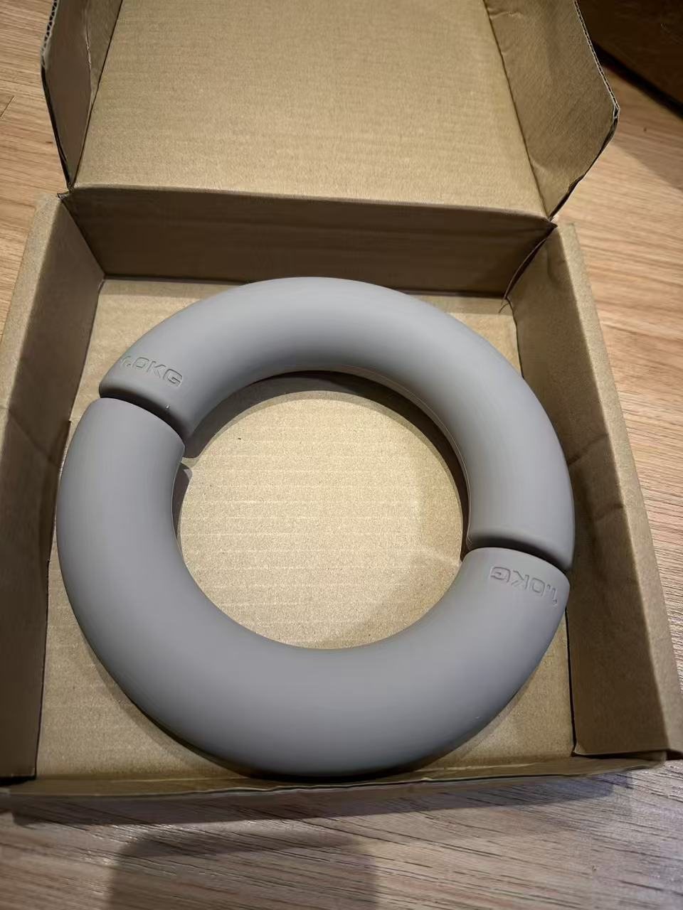 Gray semi-round silicone dumbbell pair in paper box