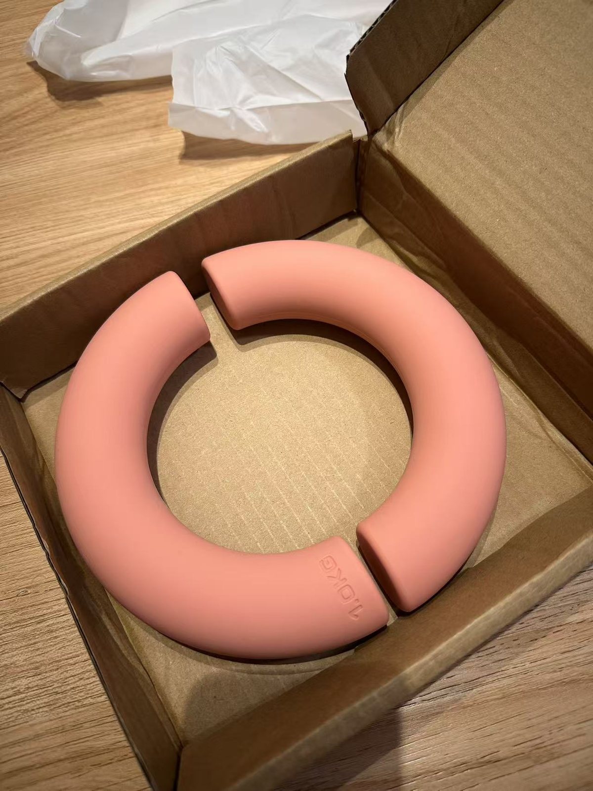 Pink semi-round silicone dumbbell pair in paper box