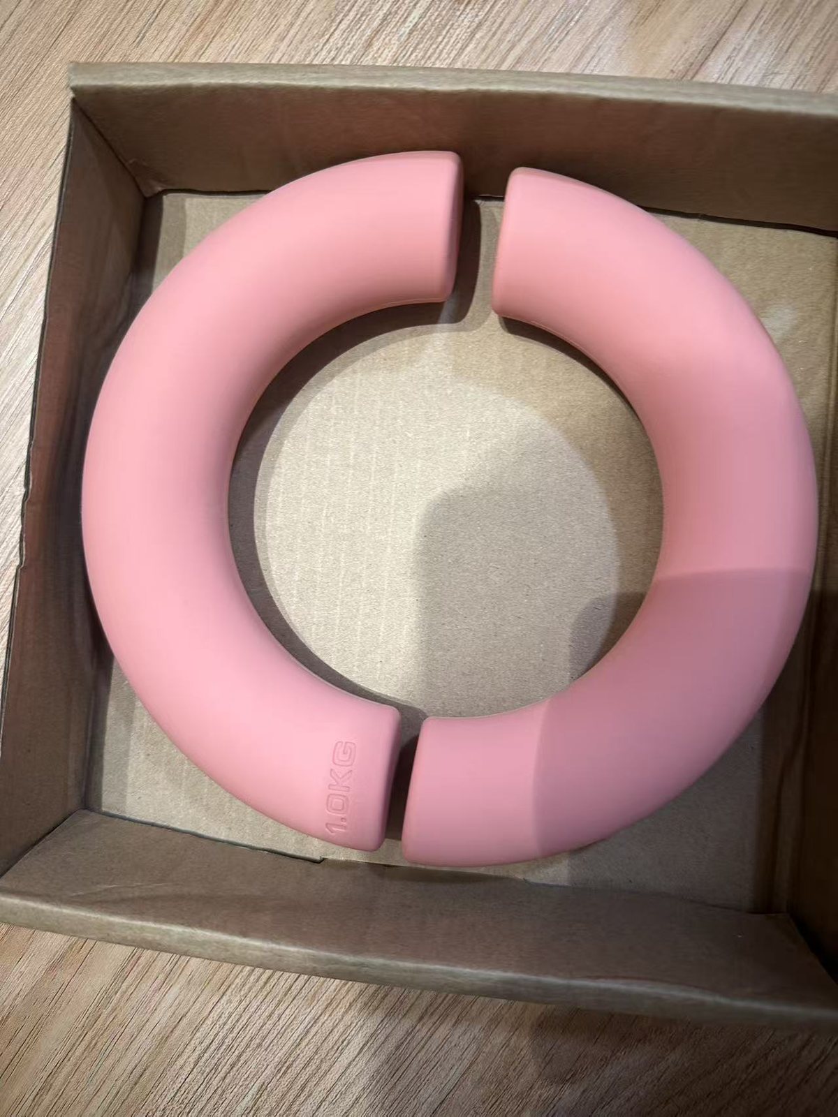 Pink semi-round silicone dumbbell pair real product close-up