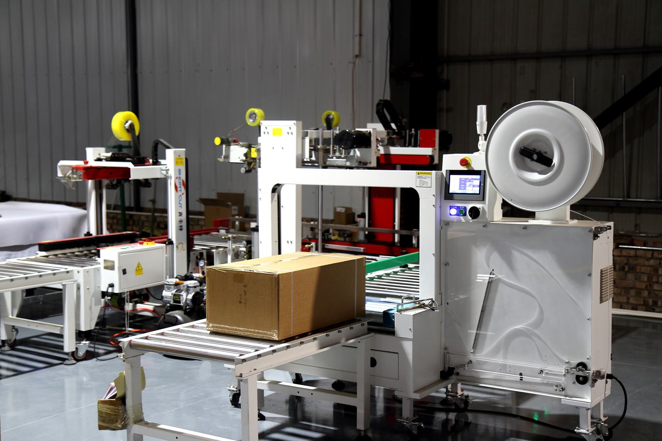 Automatic packaging equipment for retail-ready fitness products