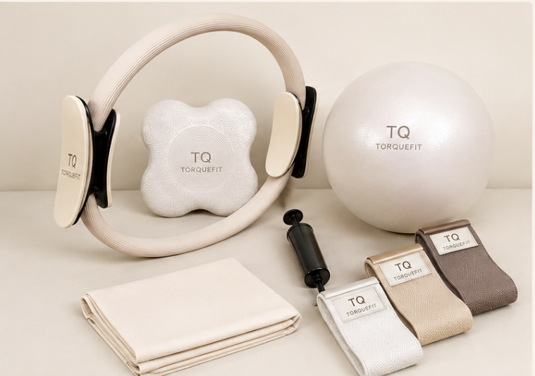 Private label Pilates and fitness product collection with branded accessories in a neutral color set