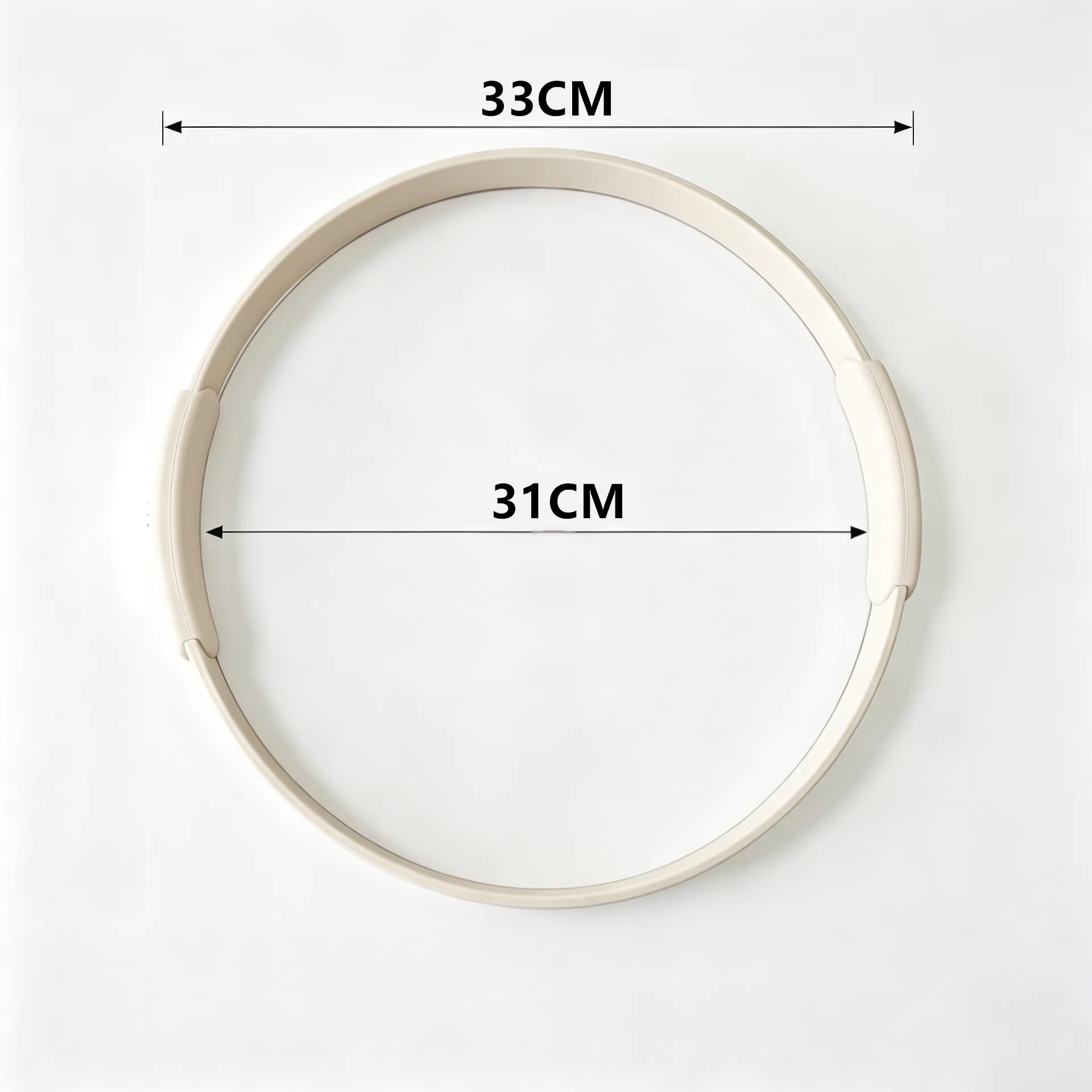 Silicone Pilates ring dimensions showing 33 cm outer and 31 cm inner diameter